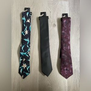 3 Express men’s ties. New with tags/on hangars. $50 for all 3 or $20/each.